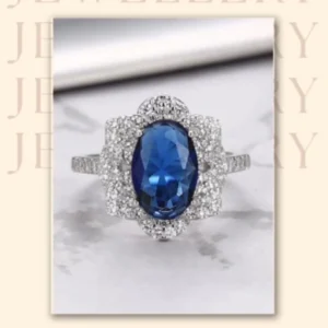 Ocean's Embrace: Victoria Blue Gem Ring