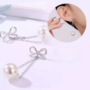 Serene Bow: Pearl Elegance Earrings
