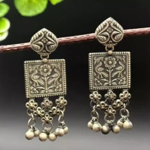 Luminous Charm: Modern Silver Earrings for an Elevated Look