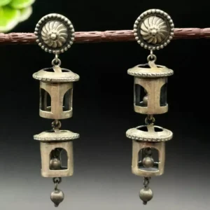 Radiant Haven: Silver Jhumka House Earrings for a Touch of Modern Elegance