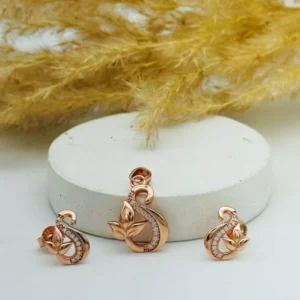 Golden Whisper: Leaf Pendant and Earring Set in Silver