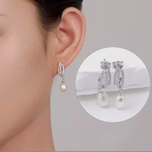 Lustrous Pearl Essence: Silver Sling Earrings